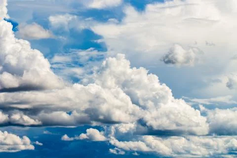Colorful dramatic sky with cloud at sunset. Stock Photos