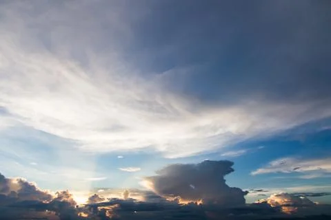 Colorful dramatic sky with cloud at sunset. Stock Photos