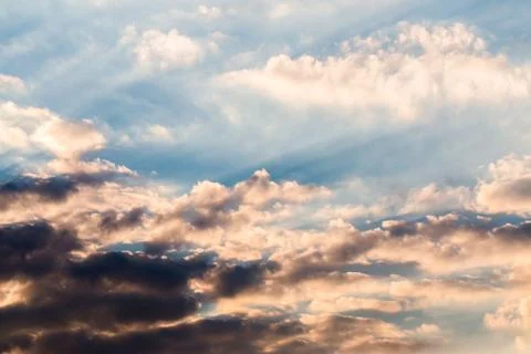 Colorful dramatic sky with cloud at sunset. Stock Photos