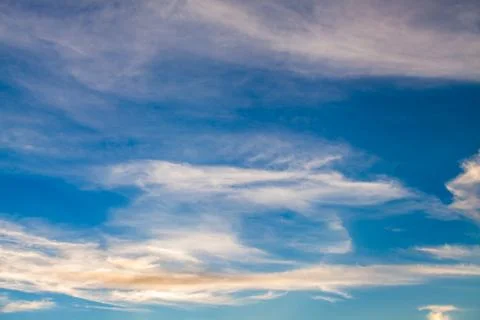 Colorful dramatic sky with cloud at sunset. Stock Photos