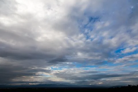Colorful dramatic sky with cloud at sunset. 写真素材