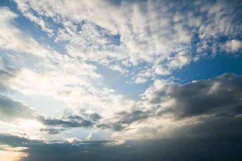Colorful dramatic sky with cloud at sunset. Stock Photos