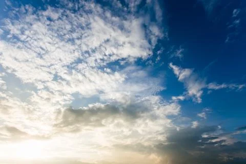Colorful dramatic sky with cloud at sunset. Stock Photos