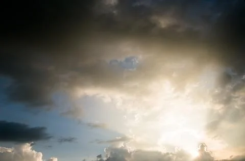 Colorful dramatic sky with cloud at sunset. Stock Photos