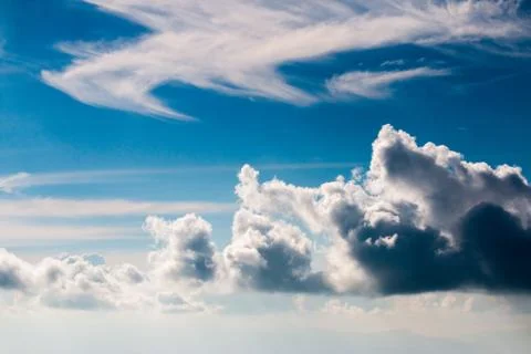 Colorful dramatic sky with cloud at sunset. Stockfoto's