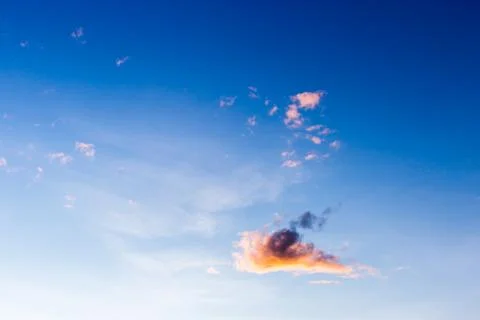 Colorful dramatic sky with cloud at sunset. Stock Photos