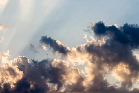 Colorful dramatic sky with cloud at sunset. Stock Photos