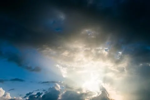 Colorful dramatic sky with cloud at sunset. Stock Photos