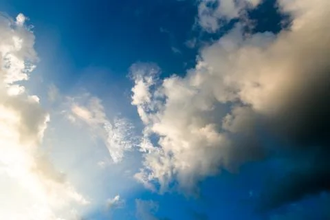 Colorful dramatic sky with cloud at sunset. Stock Photos