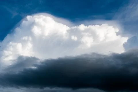 Colorful dramatic sky with cloud at sunset. Stock Photos