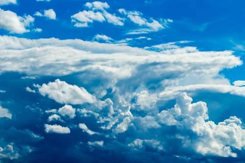 Colorful dramatic sky with cloud at sunset. Stock Photos