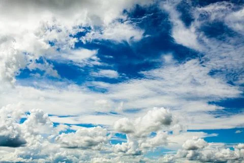 Colorful dramatic sky with cloud at sunset. Stock Photos