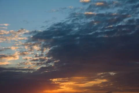 Colorful dramatic sky with cloud at sunset Stock Photos