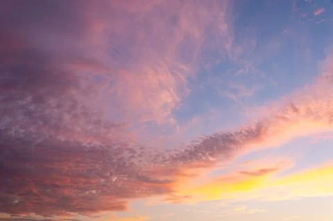 Colorful dramatic sky with cloud at sunset Stock Photos