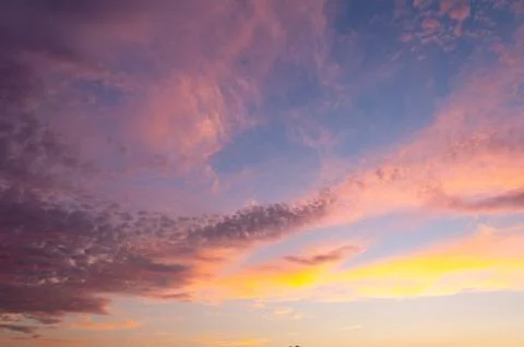 Colorful dramatic sky with cloud at sunset Stock Photos