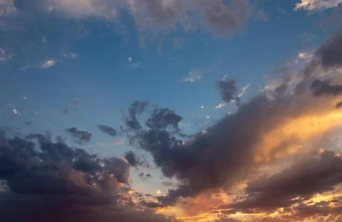 Colorful dramatic sky with cloud at sunset Stock Photos