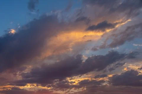 Colorful dramatic sky with cloud at sunset Stock Photos