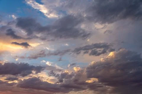 Colorful dramatic sky with cloud at sunset Stock Photos