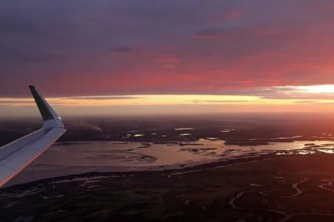 Colorful dramatic sky with cloud at sunset over Dnipro river near Kyiv 스톡 사진