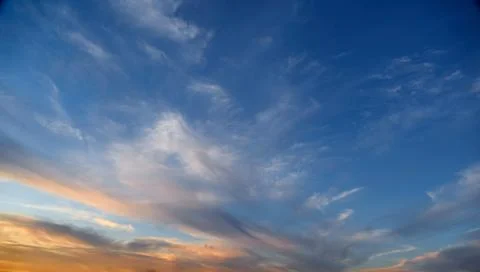 Colorful dramatic sky with cloud at sunset Stock Photos