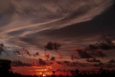 Colorful dramatic sky with cloud at sunset Stock Photos