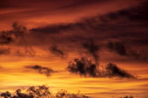 Colorful dramatic sky with cloud at sunset Stock Photos