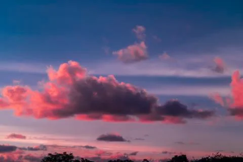 Colorful dramatic sky with cloud at sunset Stock Photos