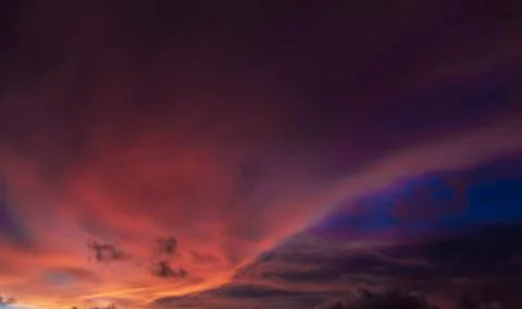 Colorful dramatic sky with cloud at sunset Stock Photos