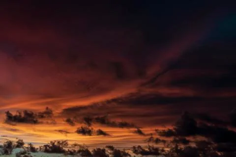 Colorful dramatic sky with cloud at sunset Stock Photos