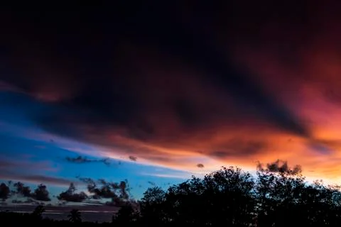 Colorful dramatic sky with cloud at sunset Stock Photos
