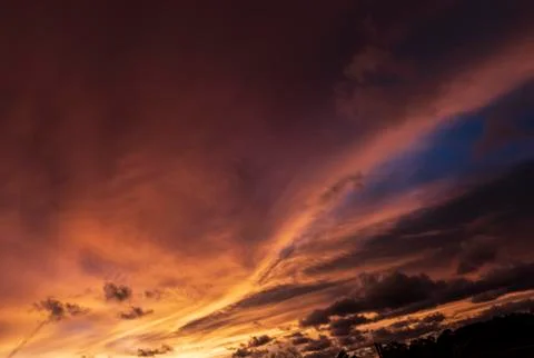 Colorful dramatic sky with cloud at sunset Stock Photos
