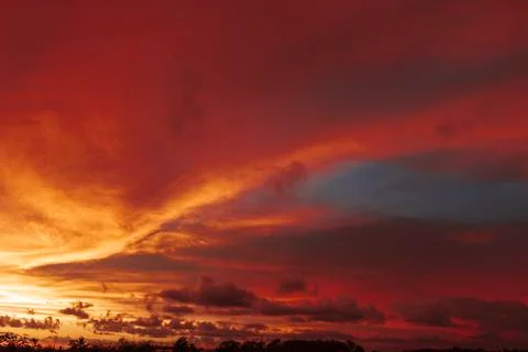 Colorful dramatic sky with cloud at sunset Stock Photos