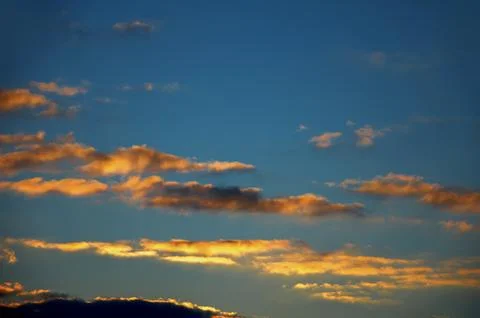 Colorful dramatic sky with cloud at sunset Stock Photos