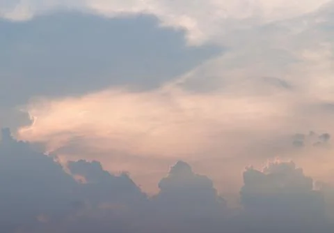 Colorful dramatic sky with cloud before sunset. Stock Photos