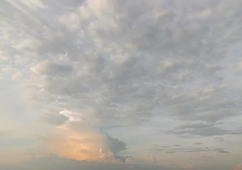 Colorful dramatic sky with cloud before sunset. Amazing clouds like a heave.. Stock Photos