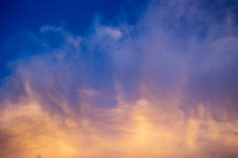 Colorful dramatic sky with cloud at sunset Stock Photos