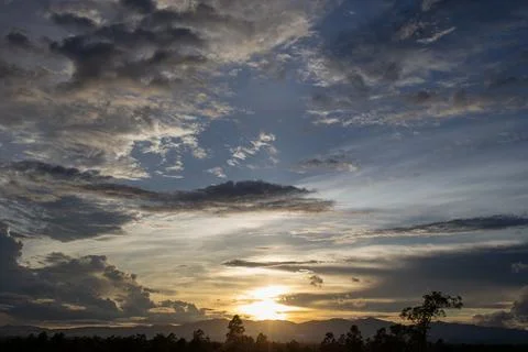 Colorful dramatic sky with cloud at sunset Stock Photos