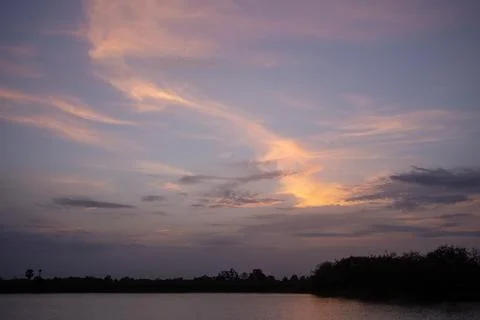 Colorful dramatic sky with cloud at sunset Stock Photos