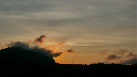 Colorful dramatic sky with cloud at sunset.Sky with sun background Stock Footage 165966677