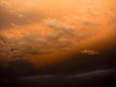 Colorful dramatic sky with cloud at sunset.Sky background.Sky with clouds at sun Stock Photos
