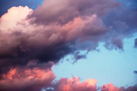 Colorful dramatic sky with clouds at sunset for background and texture Stock Photos