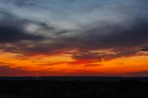 Colorful dramatic sky at sunset. Cold evening Stock Photos