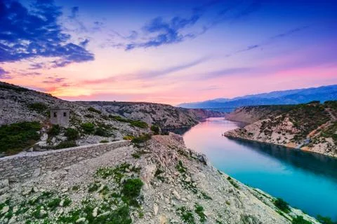 Colorful Dramatic Sunset Over the River And Mountains In Dalmatia, Croatia 스톡 사진