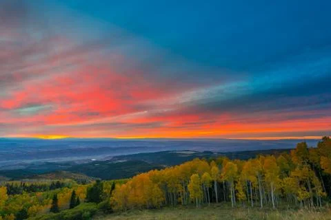 Colorful dramatic sunset sky over the city of moab fall colors Stock Photos