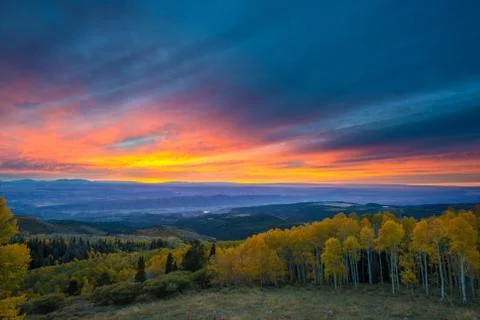 Colorful dramatic sunset sky over the city of moab fall colors Stock Photos