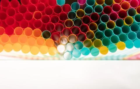 Colorful drinking straws background with reflection Stock Photos