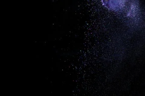 Colorful dust explode at black background. Celebrate Indian Holi festival of  Foto stock