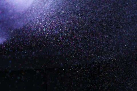 Colorful dust explode at black background. Celebrate Indian Holi festival of  Stock Photos