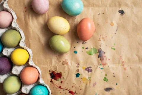Colorful dyed easter eggs on table. Preparation for Easter Stock Photos