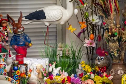 Colorful easter bunny and spring decorations display Stock Photos